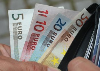 What a sinking euro means for consumers in Europe and US