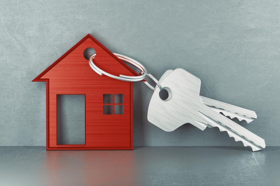 HOUSE KEYS - The Brief | Namibia's Leading Business & Financial News Red house-shaped keychain with a ring of two silver keys, symbolizing home ownership.
