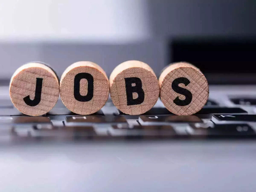 JOBS - The Brief | Namibia's Leading Business & Financial News Wooden letter blocks spell 'JOBS' resting on a laptop keyboard.