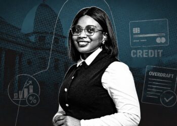 Smiling woman in business attire against a blue financial-themed backdrop with credit card and overdraft icons.