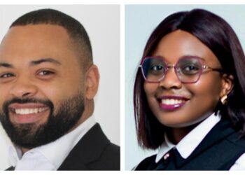 Two professional headshots side by side: left a smiling man in a suit, right a smiling woman in a blazer with glasses and dark hair.