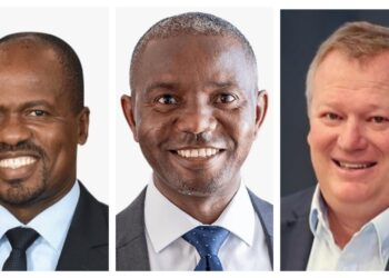 Triptych of three men in business suits smiling for professional headshots, presented side by side.