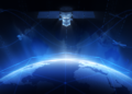 LEO Satellite arrives in Namibia as the Twoobii - The Brief | Namibia's Leading Business & Financial News Blue-toned illustration of a satellite above a glowing Earth, with digital network lines symbolizing global connectivity and space tech.