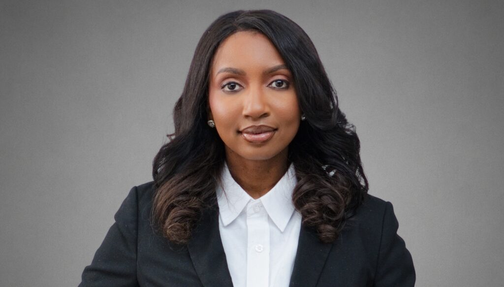 Morna - The Brief | Namibia's Leading Business & Financial News Professional woman in a black blazer and white shirt, facing the camera against a gray backdrop (head-and-shoulders portrait).