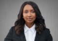 Morna - The Brief | Namibia's Leading Business & Financial News Professional woman in a black blazer and white shirt, facing the camera against a gray backdrop (head-and-shoulders portrait).