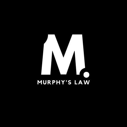 Murphys Law - The Brief | Namibia's Leading Business & Financial News Murphy's Law brand logo: large white M with a dot on a black background and 'MURPHY'S LAW' text below.