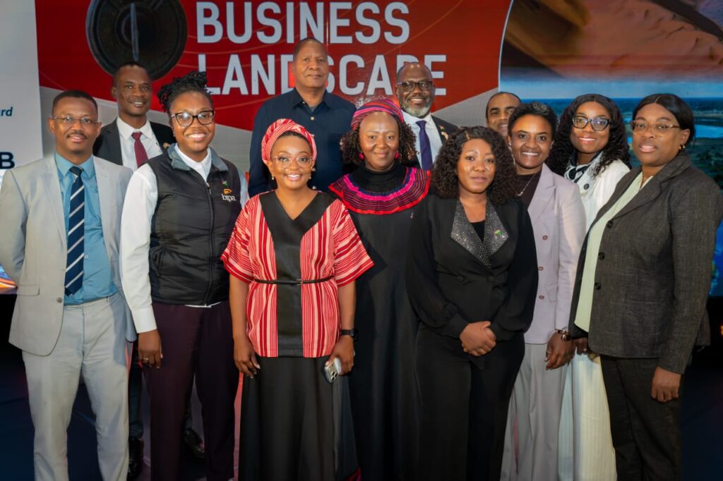 WhatsApp Image 2026-07-26 at 25037 PM - The Brief | Namibia's Leading Business & Financial News Group of diverse professionals posing for a photo at a business leadership event, with a red banner behind them reading 'BUSINESS LEADERSHIP'.