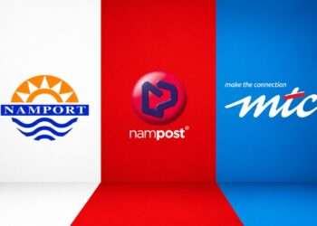 Branding wall with three logos: Namport on white, NamPost on red, and MITC on blue, arranged side by side.