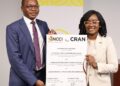WhatsApp Image 2026-07-30 at 43723 PM - The Brief | Namibia's Leading Business & Financial News Two professionals in business attire hold a large Memorandum of Agreement featuring NCCI and CRAN logos during a signing ceremony.