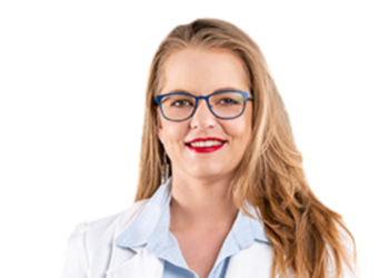 Smiling woman with blue-framed glasses and long light brown hair, wearing a light blue blouse against a white background.