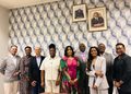 WhatsApp Image 2026-09-10 at 54046 PM - The Brief | Namibia's Leading Business & Financial News Eight professionals standing together in a conference room with a geometric blue wallpaper and framed portraits above them.