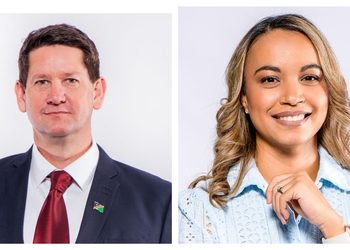 Two professional headshots: left is a man in a navy suit with a red tie; right is a smiling woman with blond hair in a light blue shirt.