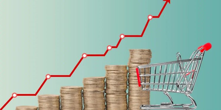 Stacked coins increasing in height beside a shopping cart, with a red upward growth line indicating rising value or costs.