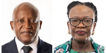 Side-by-side portraits: an older man in a dark suit and tie on the left, and a woman wearing glasses and a colorful patterned top on the right.