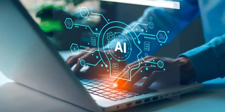 Hands typing on a laptop with a glowing blue AI holographic network overlay above the keyboard.