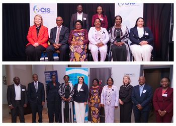 MixCollage-20-Oct-2026-04-41-PM-7093 - The Brief | Namibia's Leading Business & Financial News Group of diverse professionals in formal attire posing for a conference photo indoors with banners in the background